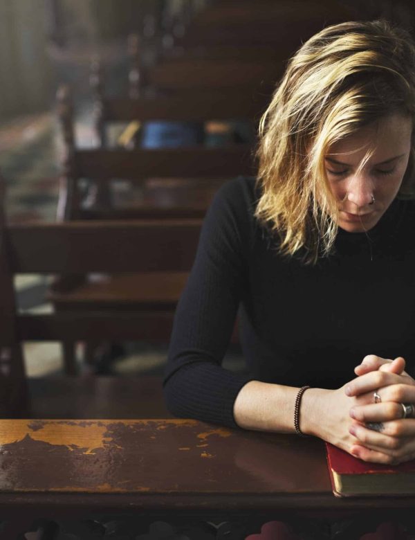 woman-praying-in-the-church-2022-12-15-23-33-07-utc (1)